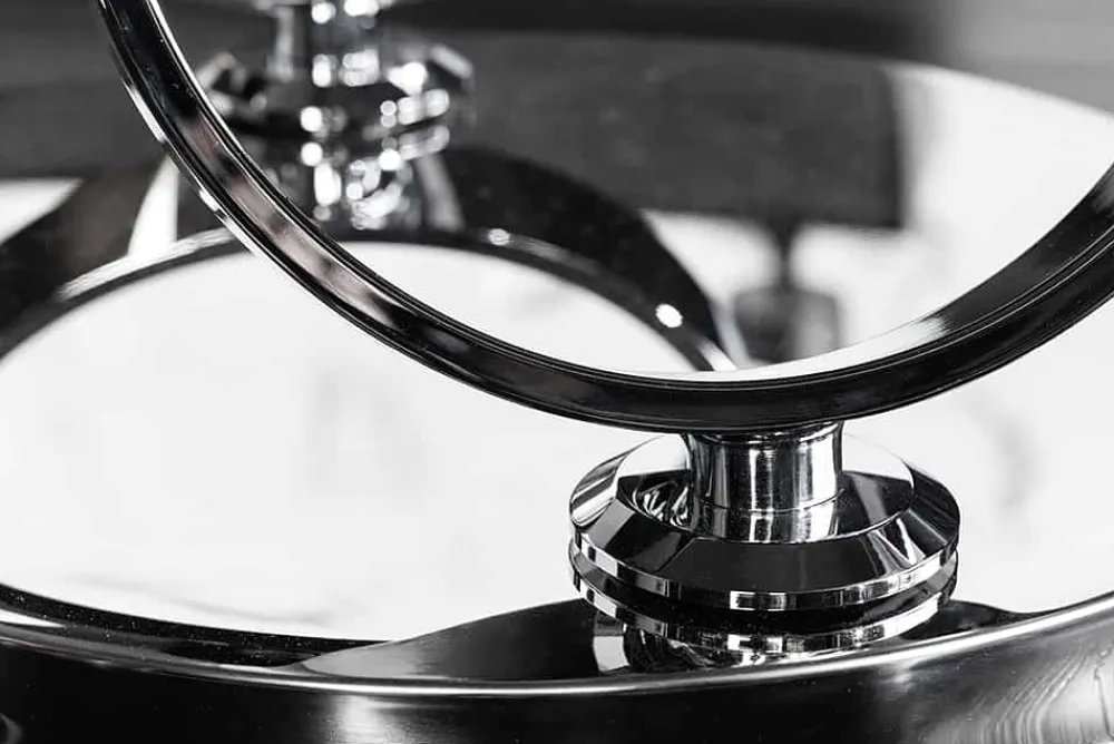 Riess-Ambiente Couchtische & Truhen > Design Couchtisch DANCING RINGS weiß rund drehbar Marmor Keramik Chrome Gestell