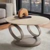 Riess-Ambiente Couchtische & Truhen > Design Couchtisch DANCING RINGS natur rund drehbar Travertin Keramik champagner greige