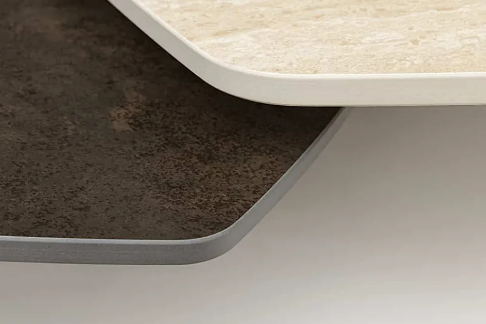 Riess-Ambiente Couchtische & Truhen > Design Couchtisch MOVEMENT rost Pentagon drehbar Travertin Keramik schwarz Metall