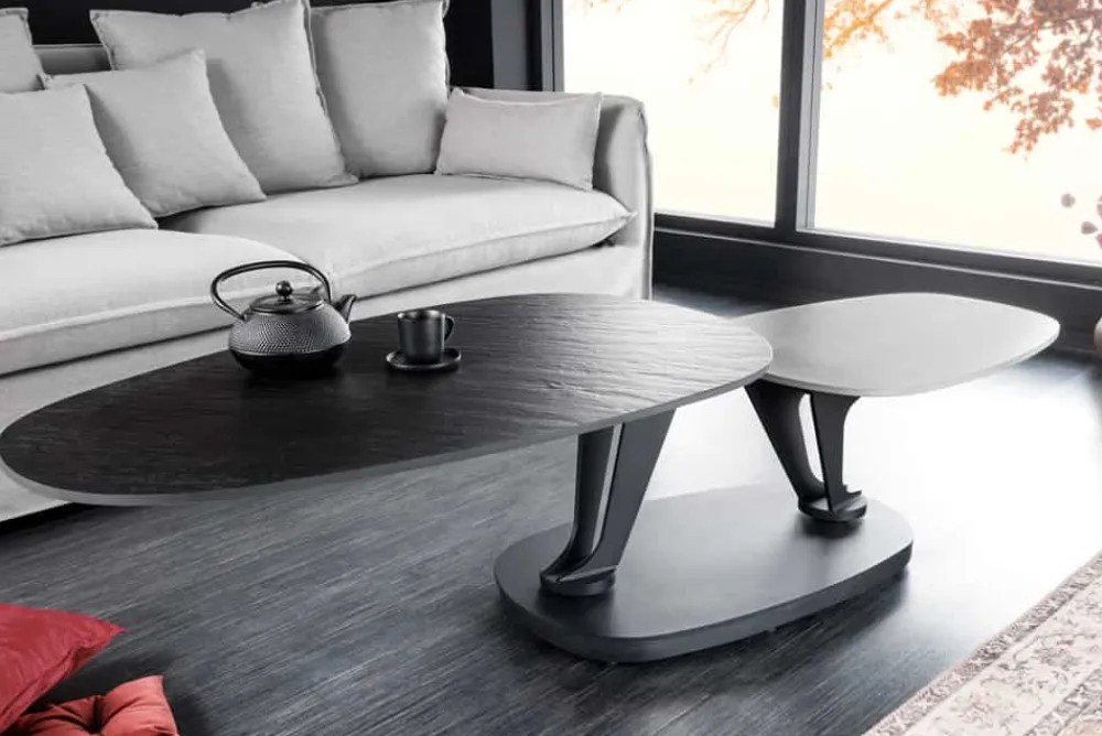 Riess-Ambiente Couchtische & Truhen > Design Couchtisch MOVEMENT schwarz grau rund drehbar Keramik Metallgestell