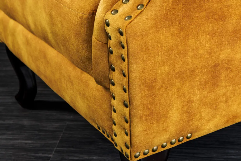 Riess-Ambiente Sessel|Samt Möbel > Design Ohrensessel CHESTERFIELD 85cm senfgelb Samt Knopfheftung
