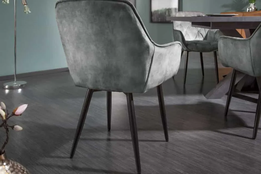 Riess-Ambiente Stühle|Samt Möbel > Design Stuhl MILANO grün Samt mit Armlehne Ziersteppung gepolstert schwarze Metallbeine