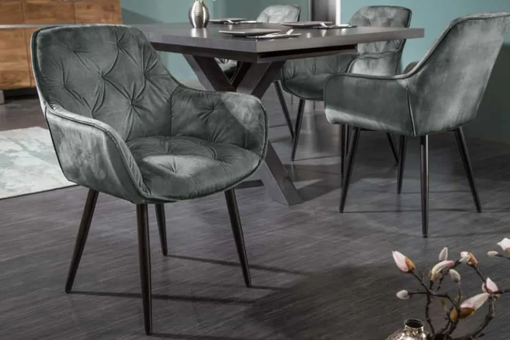 Riess-Ambiente Stühle|Samt Möbel > Design Stuhl MILANO grün Samt mit Armlehne Ziersteppung gepolstert schwarze Metallbeine