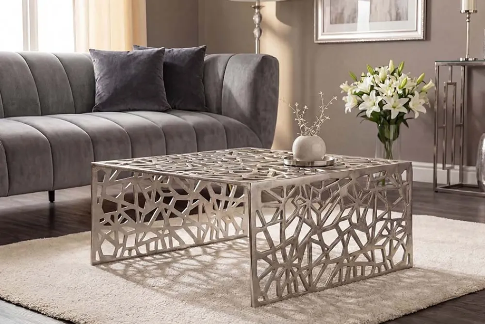 Riess-Ambiente Couchtische & Truhen > Handgearbeiteter Couchtisch ABSTRACT 60cm Alu silberfarbig im Gap Design
