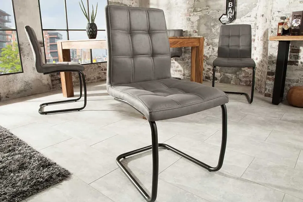 Riess-Ambiente Freischwinger|Industrial Loft > Industrial Freischwinger Stuhl MODENA vintage grau mit Ziersteppung