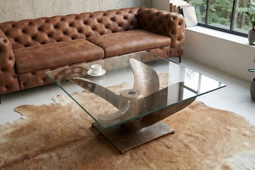 Riess-Ambiente Couchtische & Truhen > Maritimer Couchtisch OCEAN L 85cm antik kupfer mit Schiffsschraube und Glasplatte