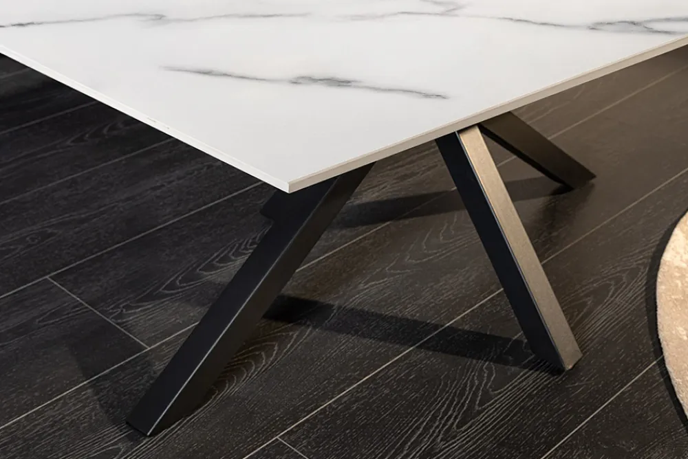 Riess-Ambiente Couchtische & Truhen > Moderner Couchtisch GALAXIE 100cm weiß Keramik schwarz Metall Sterngestell