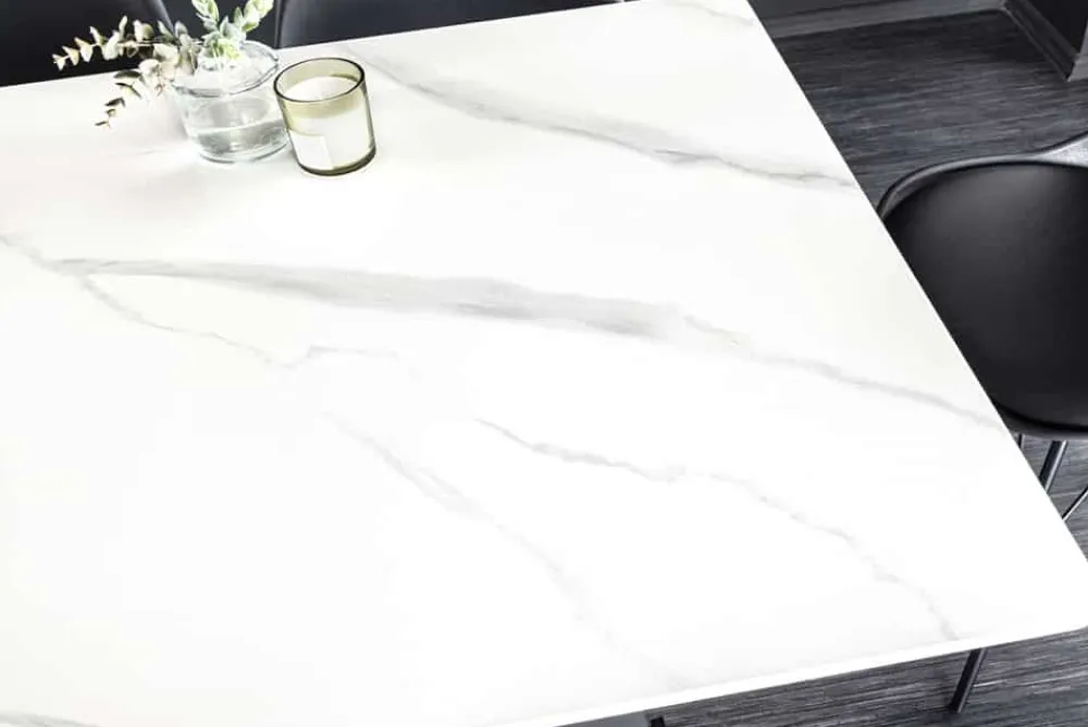 Riess-Ambiente Esstische > Moderner Esstisch GALAXIE 160cm weiß Keramik Marmor-Design glänzend Metallgestell schwarz