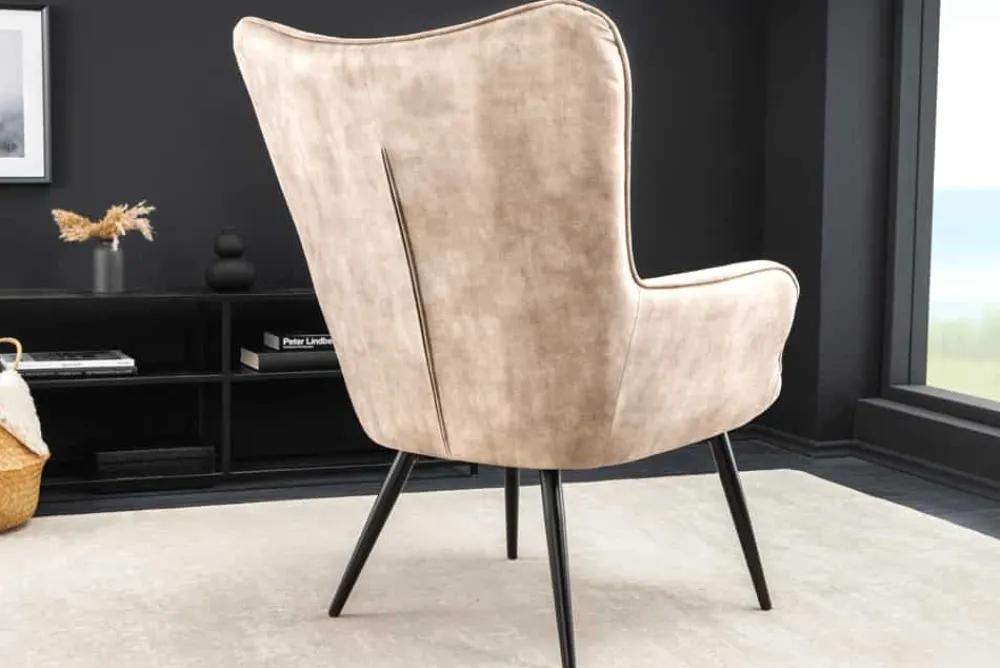 Riess-Ambiente Skandinavisch|Loungesessel > Moderner Sessel SCANDINAVIA champagner beige Samt schwarze Metallbeine mit Armlehne