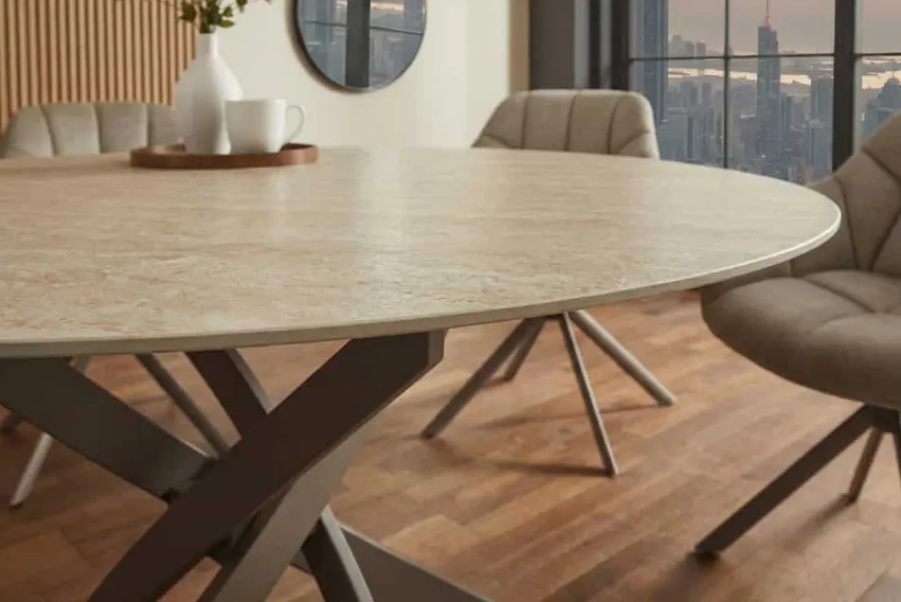 Riess-Ambiente Esstische > Runder Esstisch ALPINE 120cm natur Travertin Keramik champagner greige Metall