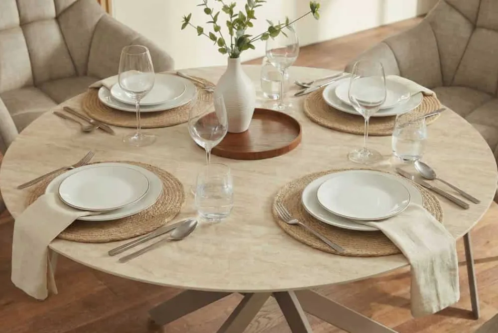 Riess-Ambiente Esstische > Runder Esstisch ALPINE 120cm natur Travertin Keramik champagner greige Metall