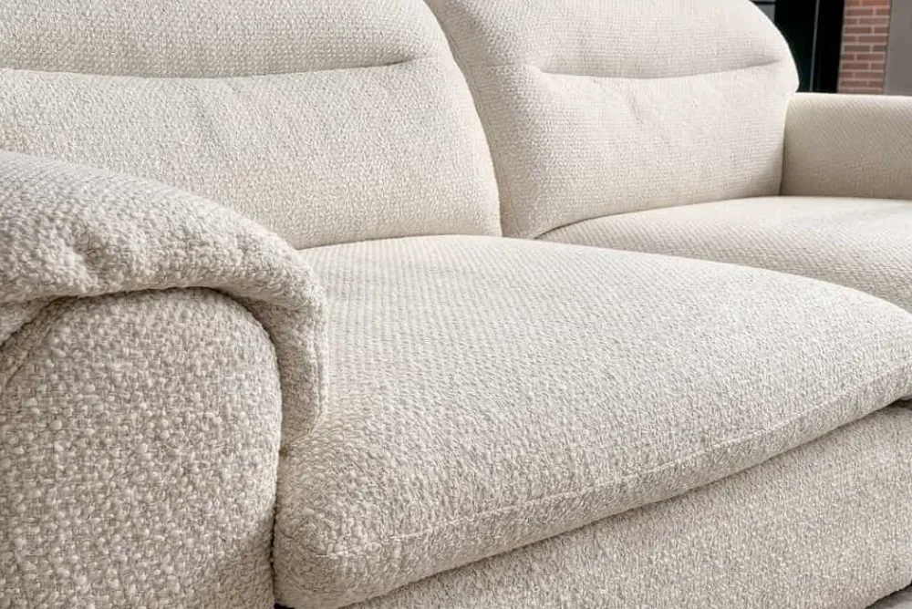 Riess-Ambiente 3-Sitzer Sofa > 3-Sitzer Sofa SIXTH SENSE 210cm beige Bouclé-Strickstoff mit Nosagfederung und Daunenfedern
